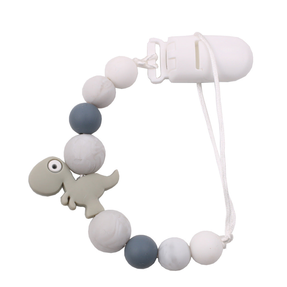 New baby pacifier chain clip teeth glue toy anti-drop chain silicone dinosaur pacifier chain baby products