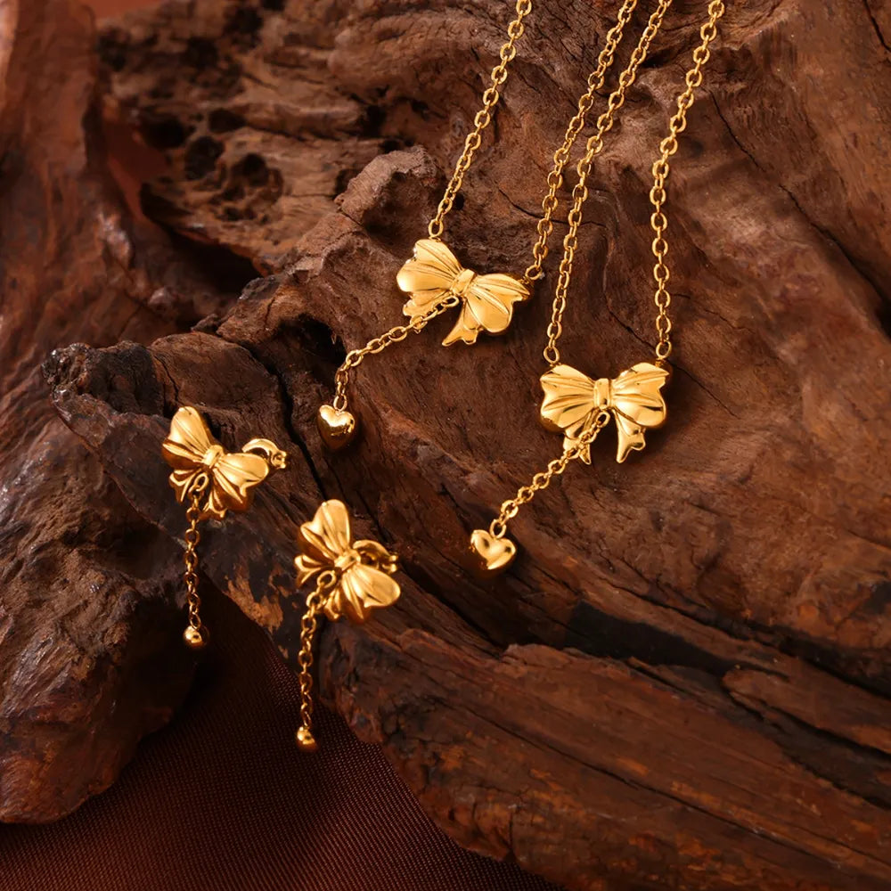 Titanium Steel Bow Earrings - V.I.P Digital Presence