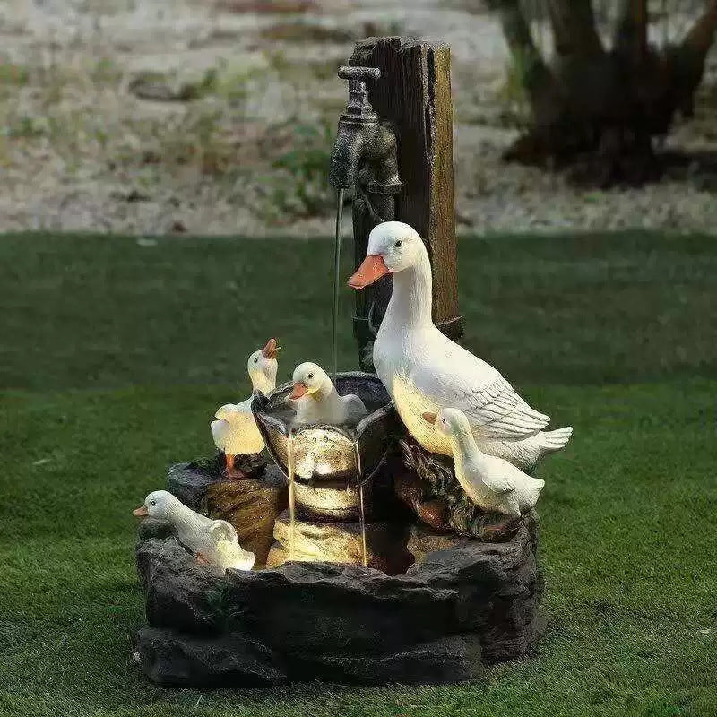 Solar resin duck garden fountain with LED squirrel design, outdoor decor (E2). - V.I.P Digital Presence
