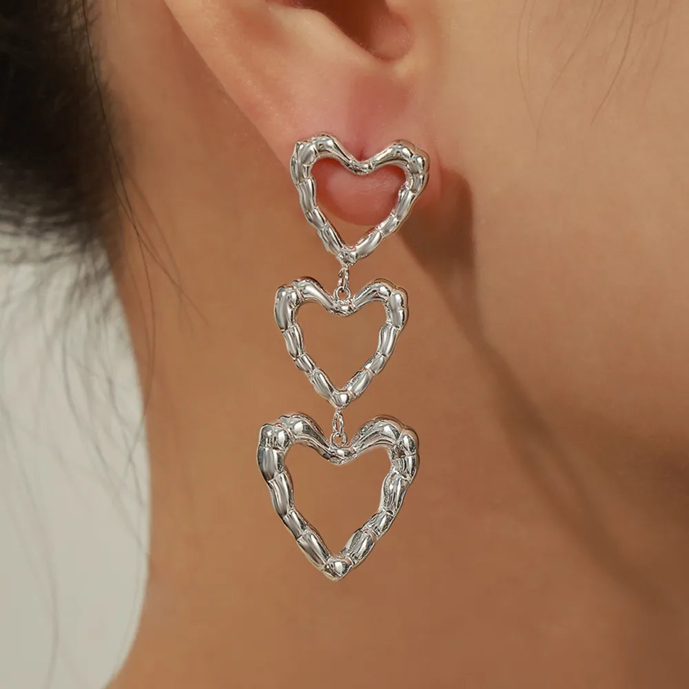 Titanium Steel Heart Earrings - V.I.P Digital Presence