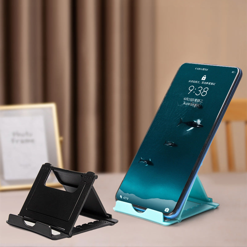 A plastic, foldable cradle for mobile phones - V.I.P Digital Presence