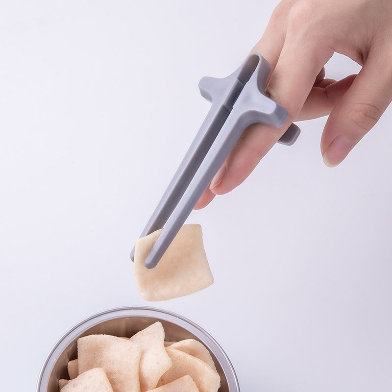 Playing games with fingers chopsticks snacking clips not dirty hands chopsticks finger loops - V.I.P Digital Presence