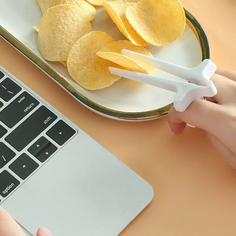 Playing games with fingers chopsticks snacking clips not dirty hands chopsticks finger loops - V.I.P Digital Presence