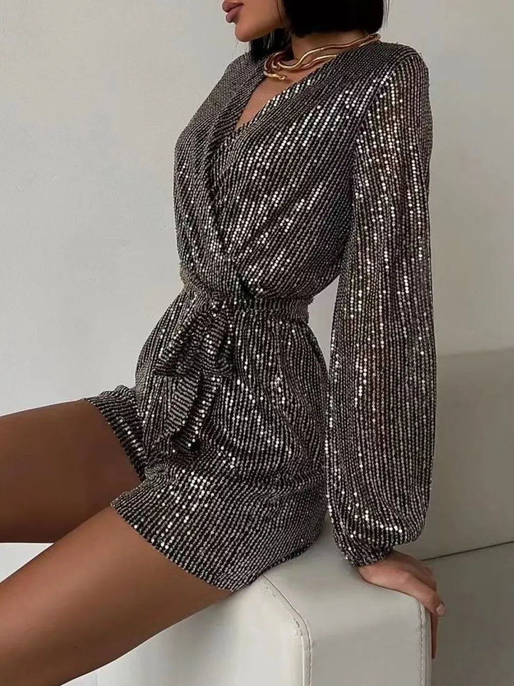 Full Size Sequin Surplice Tie Waist Long Sleeve Romper - V.I.P Digital Presence