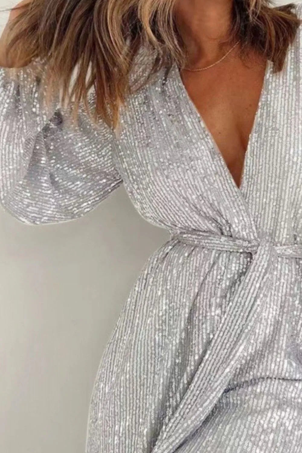 Full Size Sequin Surplice Tie Waist Long Sleeve Romper - V.I.P Digital Presence