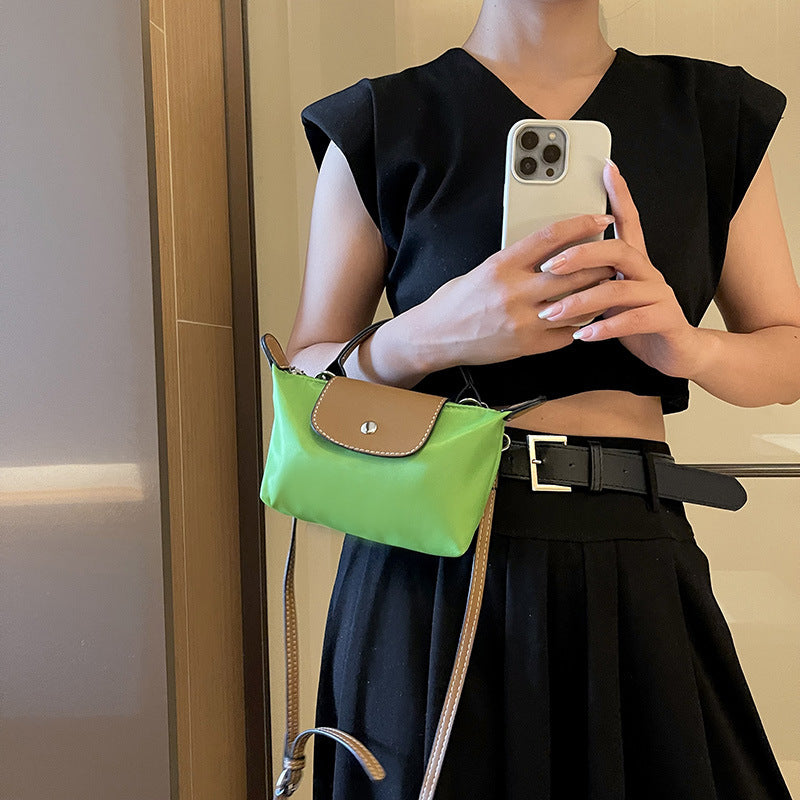 Retro fashion versatile women's bag, shoulder crossed, carrying high-end nylon dumpling bag - V.I.P Digital Presence