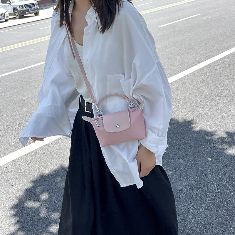 Retro fashion versatile women's bag, shoulder crossed, carrying high-end nylon dumpling bag - V.I.P Digital Presence