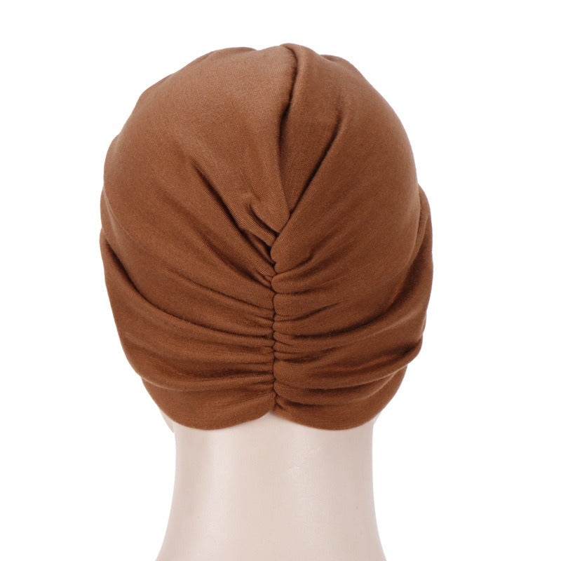 New elastic fabric with crossed candy colored twisted hat and candy colored base on the forehead - V.I.P Digital Presence