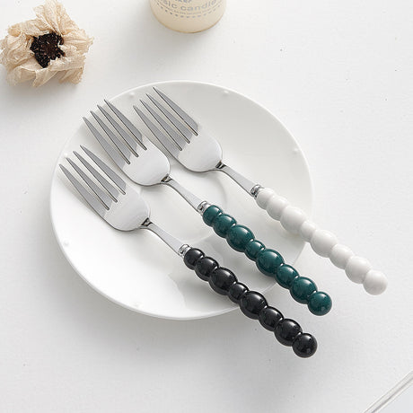 Set of 4 Stainless Steel price Creative Stainless Steel Colorful Pearl Handle Spoon Fork Knife High End Cutlery Set - V.I.P Digital Presence