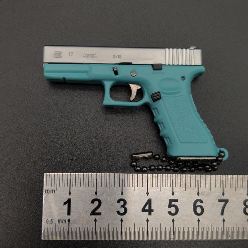 New Empire 1:3 Glock G17 alloy keychain, realistic gun model with detachable soldier gear & bullets. - V.I.P Digital Presence