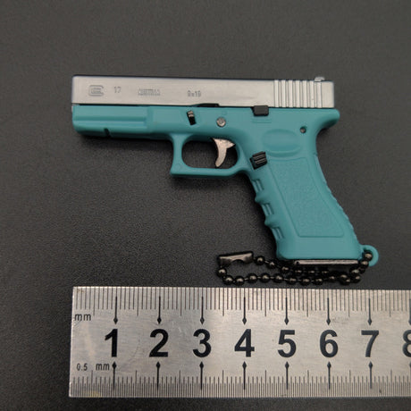 New Empire 1:3 Glock G17 alloy keychain, realistic gun model with detachable soldier gear & bullets. - V.I.P Digital Presence