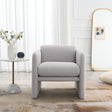 Armchair with wavy armrests, metal decorations on both sides of the armrests, made of Teddy cloth, light gray - V.I.P Digital Presence