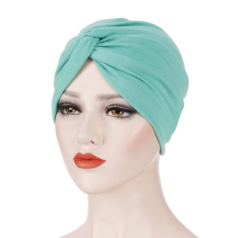 New elastic fabric with crossed candy colored twisted hat and candy colored base on the forehead - V.I.P Digital Presence