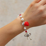 Sweet strawberry bow bracelet Bracelet temperament versatile imitation pearl vacation jewelry - V.I.P Digital Presence