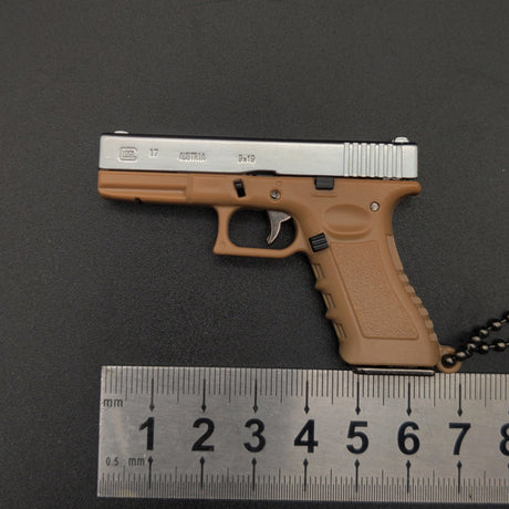 New Empire 1:3 Glock G17 alloy keychain, realistic gun model with detachable soldier gear & bullets. - V.I.P Digital Presence