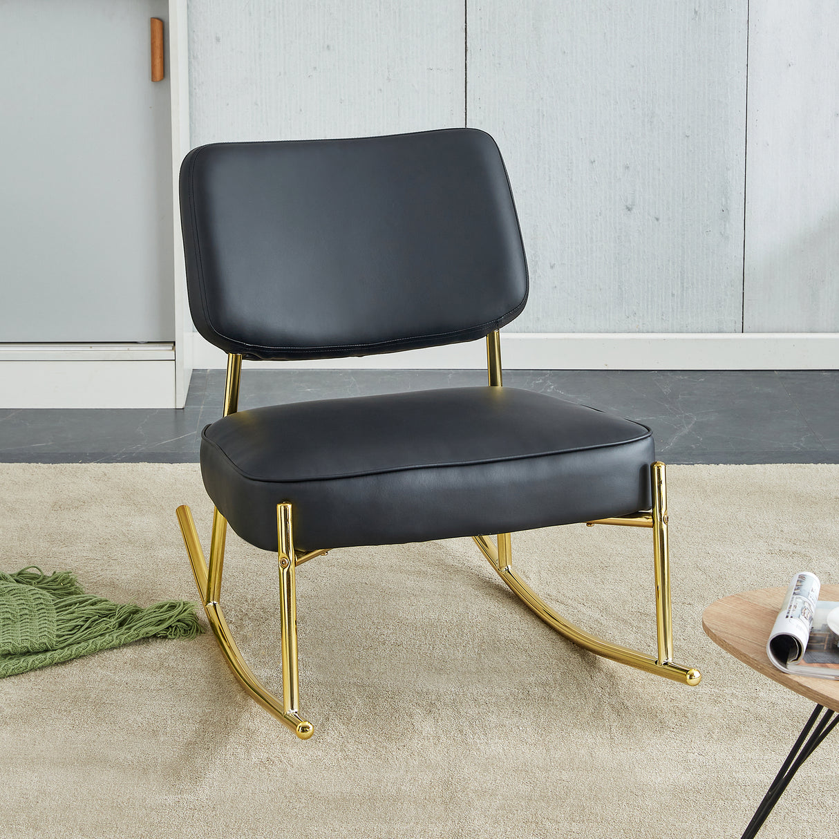 PU material cushioned rocking chair unique rocking chair cushioned seat black backrest rocking chair and gold metal legs