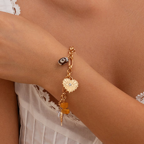 Fashionable and versatile peach heart turquoise bracelet, irregular alloy multi-element shell bracelet - V.I.P Digital Presence