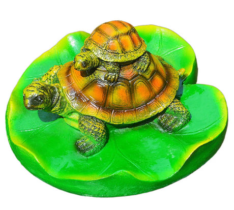 Turtle resin ornaments floating on the water surface - V.I.P Digital Presence