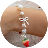 Sweet strawberry bow bracelet Bracelet temperament versatile imitation pearl vacation jewelry - V.I.P Digital Presence