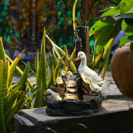Solar resin duck garden fountain with LED squirrel design, outdoor decor (E2). - V.I.P Digital Presence