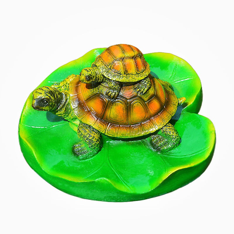Turtle resin ornaments floating on the water surface - V.I.P Digital Presence
