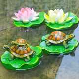 Turtle resin ornaments floating on the water surface - V.I.P Digital Presence