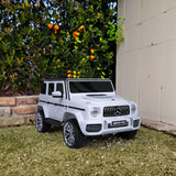 Mercedes Benz G63 Children's Electric Vehicle with Remote Control 12V Music, Horn, Spring Suspension, Safety Lock and License - V.I.P Digital Presence