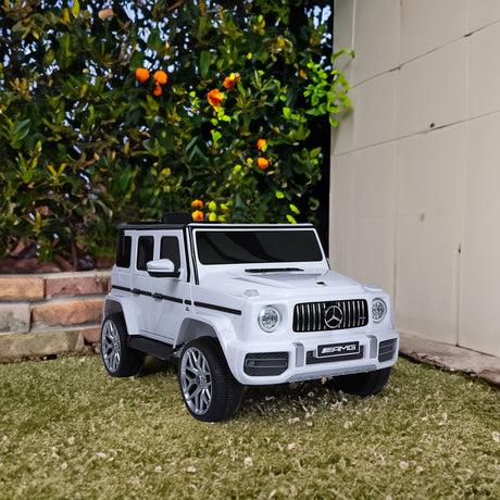 Mercedes Benz G63 Children's Electric Vehicle with Remote Control 12V Music, Horn, Spring Suspension, Safety Lock and License - V.I.P Digital Presence
