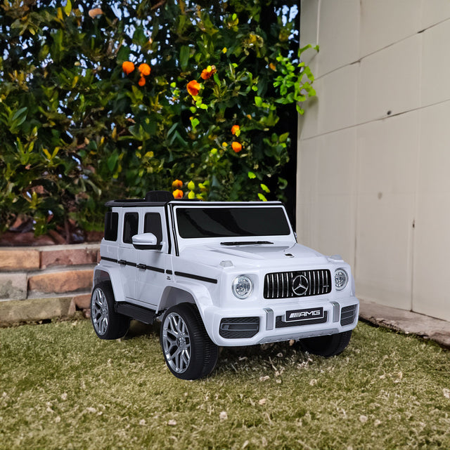 Mercedes Benz G63 Children's Electric Vehicle with Remote Control 12V Music, Horn, Spring Suspension, Safety Lock and License - V.I.P Digital Presence