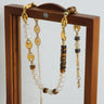Versatile Light Luxury Titanium Steel Freshwater Pearl Tiger Eye Stone Pig Nose Chain Necklace Jewelry for Women - V.I.P Digital Presence