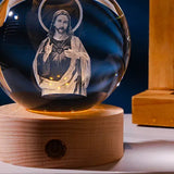Luminous crystal ball with carved Jesus solid wood base for home decoration - V.I.P Digital Presence