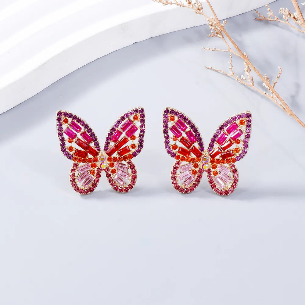 Alloy Inlaid Rhinestone Butterfly Earrings - V.I.P Digital Presence