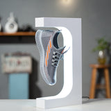 Magnetic levitation acrylic platform desktop advertising rotating display platform Magnetic levitation shoe display rack - V.I.P Digital Presence