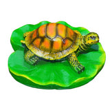 Turtle resin ornaments floating on the water surface - V.I.P Digital Presence