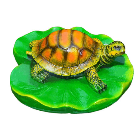 Turtle resin ornaments floating on the water surface - V.I.P Digital Presence