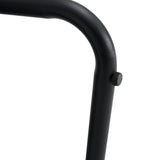 Black minimalist armless sofa chair with PU backrest paired with black metal legs