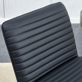 Black minimalist armless sofa chair with PU backrest and golden metal legs suitable for offices restaurants