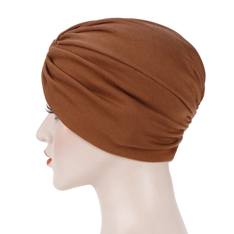 New elastic fabric with crossed candy colored twisted hat and candy colored base on the forehead - V.I.P Digital Presence