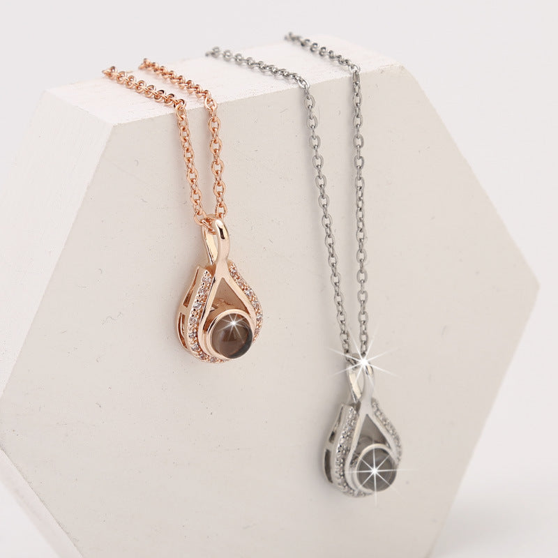 Waterdrop shaped fashion projection necklace with 100 languages. I love you. Color photos, customized lover accessories - V.I.P Digital Presence